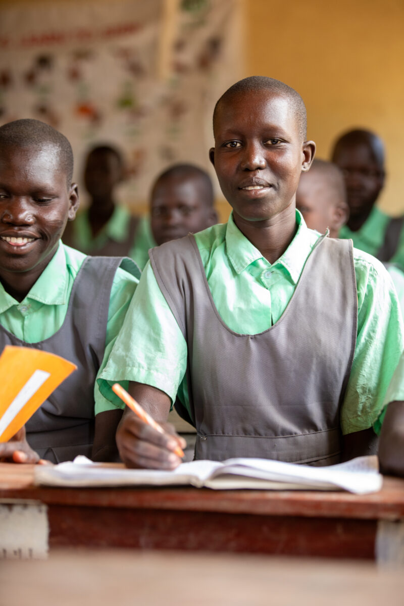 Happy to Be In School — Youn girls in South Sudan Africa are going back to school — Adult, Beard, Eyes Closed, Eyes Open, Frontal Face