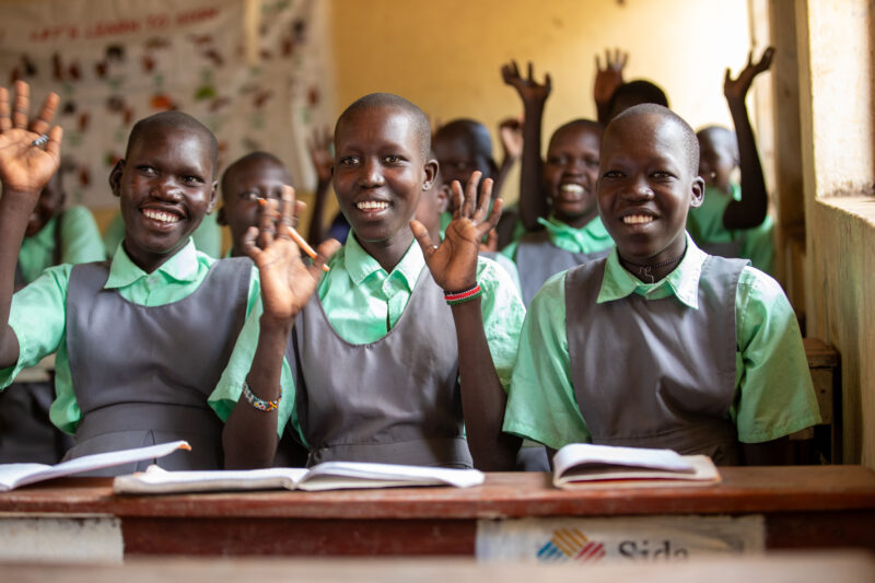 Happy to Be In School — Youn girls in South Sudan Africa are going back to school — Adult, Beard, Eyes Open, Female, Frontal Face