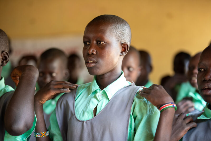 Happy to Be In School — Youn girls in South Sudan Africa are going back to school — Adult, Frontal Face, Male, Person, Profile Face