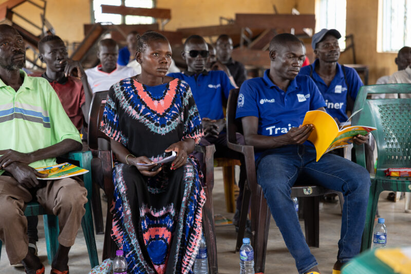 Teacher Training — Teachers go back to school to learn new methods of teaching in rural South Sudan. — Adult, Beard, Eyes Open, Frontal Face, Group