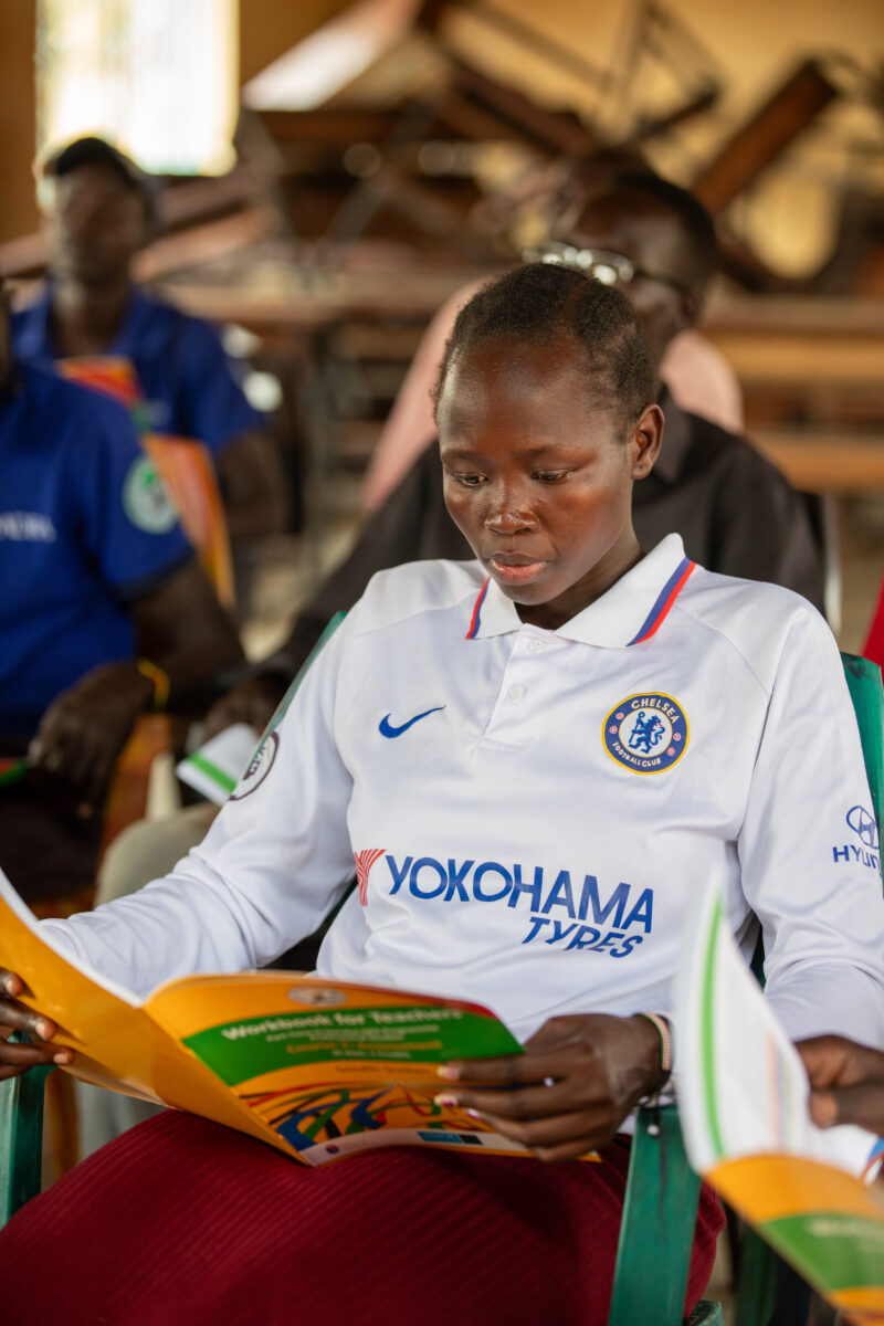 Teacher Training — Teachers go back to school to learn new methods of teaching in rural South Sudan. — Ball, Ball Game, Female, Frontal Face, One Face