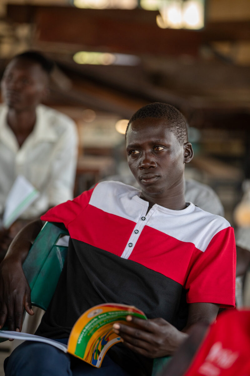 Teacher Training — Teachers go back to school to learn new methods of teaching in rural South Sudan. — Adult, Boat, Eyes Open, Frontal Face, Male
