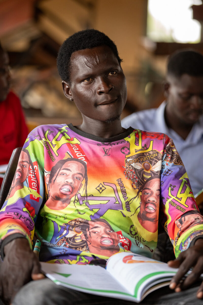 Teacher Training — Teachers go back to school to learn new methods of teaching in rural South Sudan. — Adult, Beard, Eyes Open, Frontal Face, Group