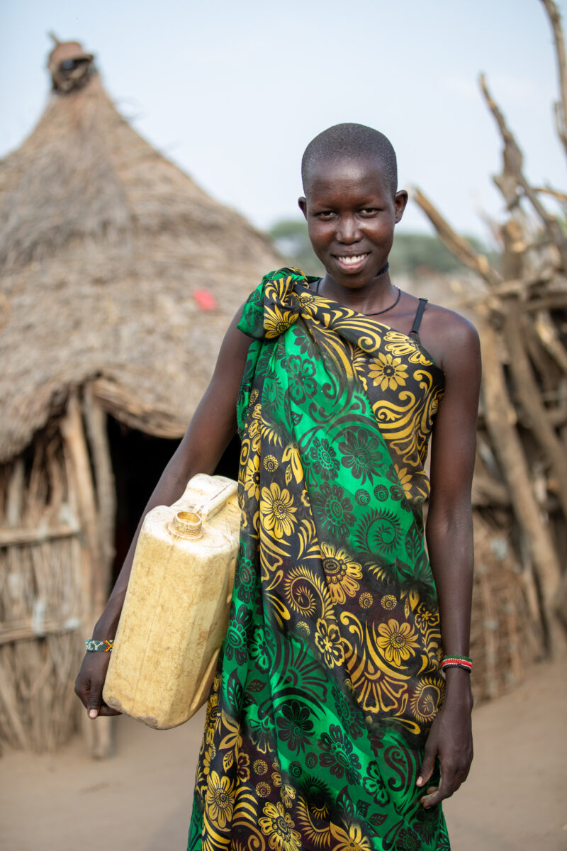 Girl with Water Container