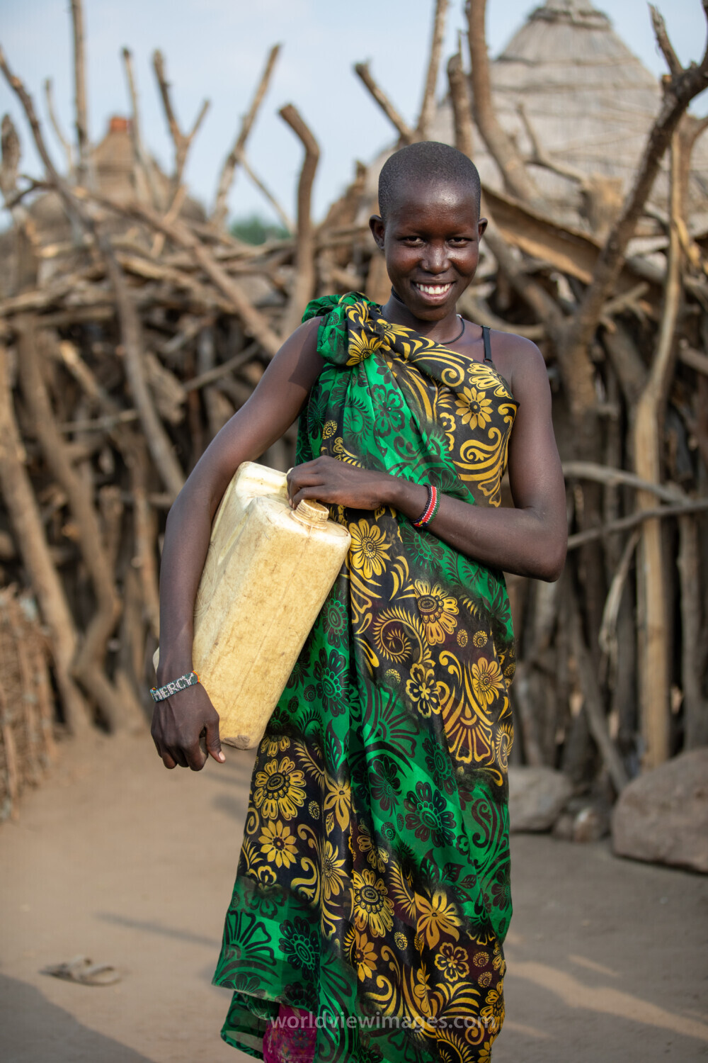Girl with Water Container