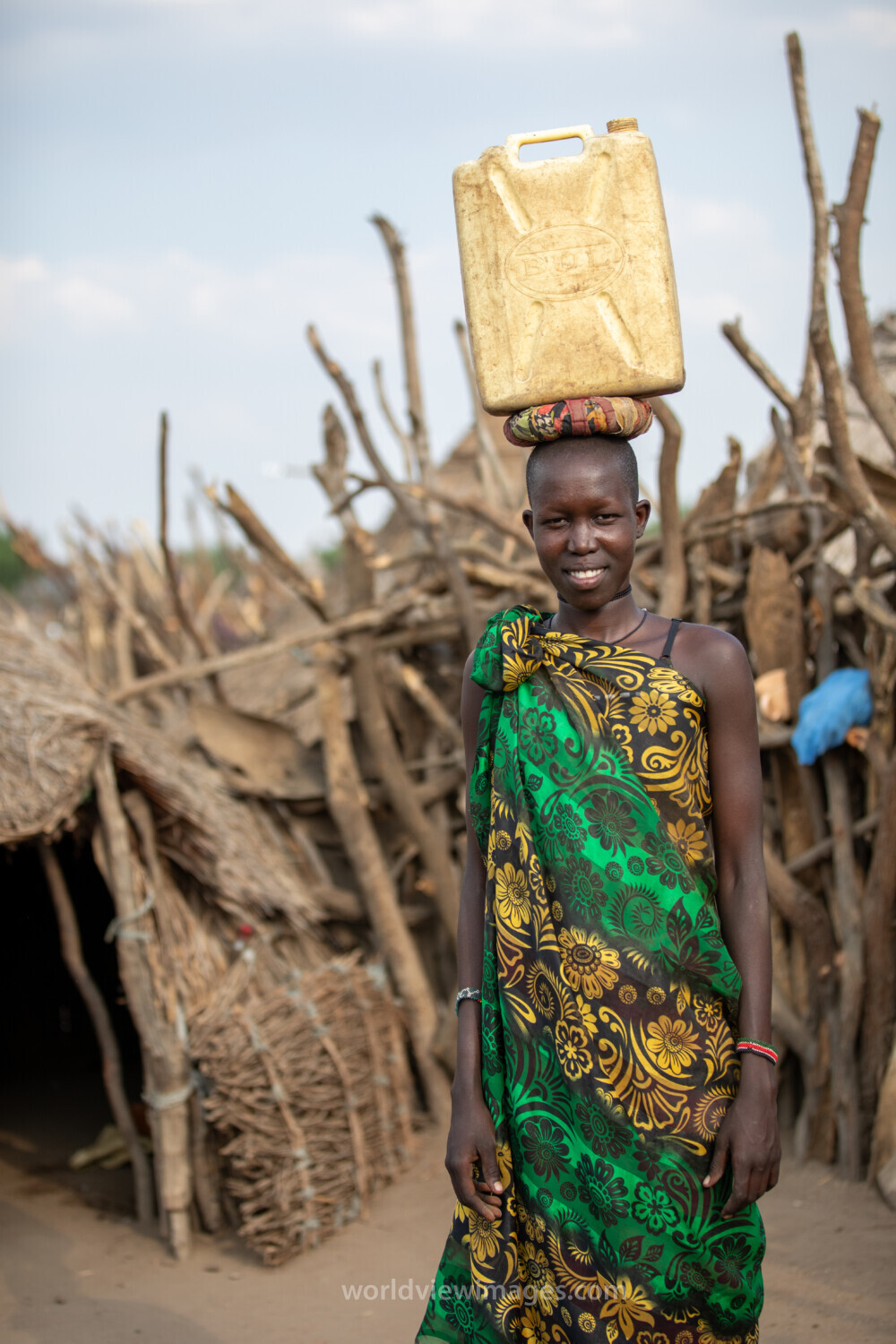 Girl with Water Container