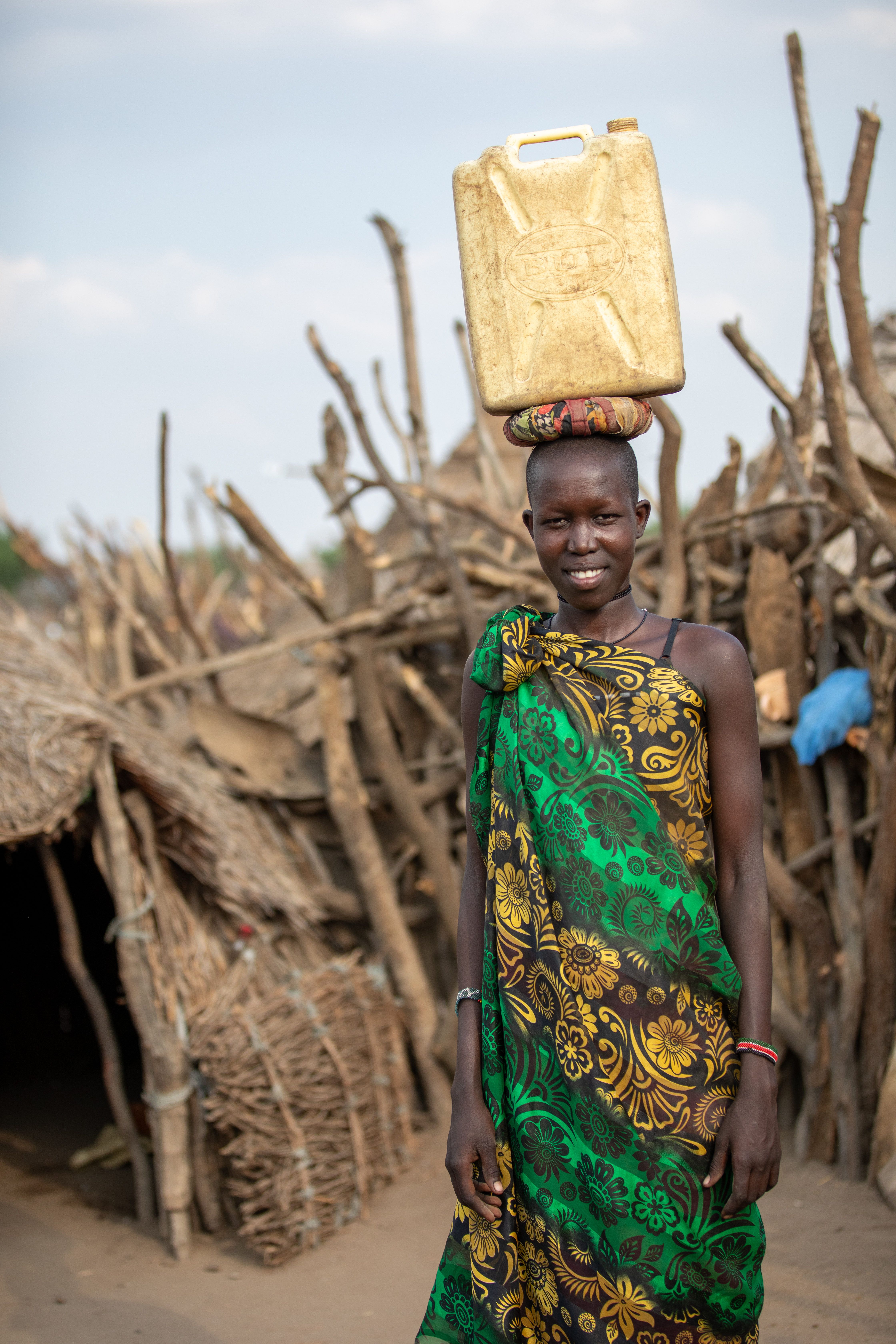 Girl with Water Container
