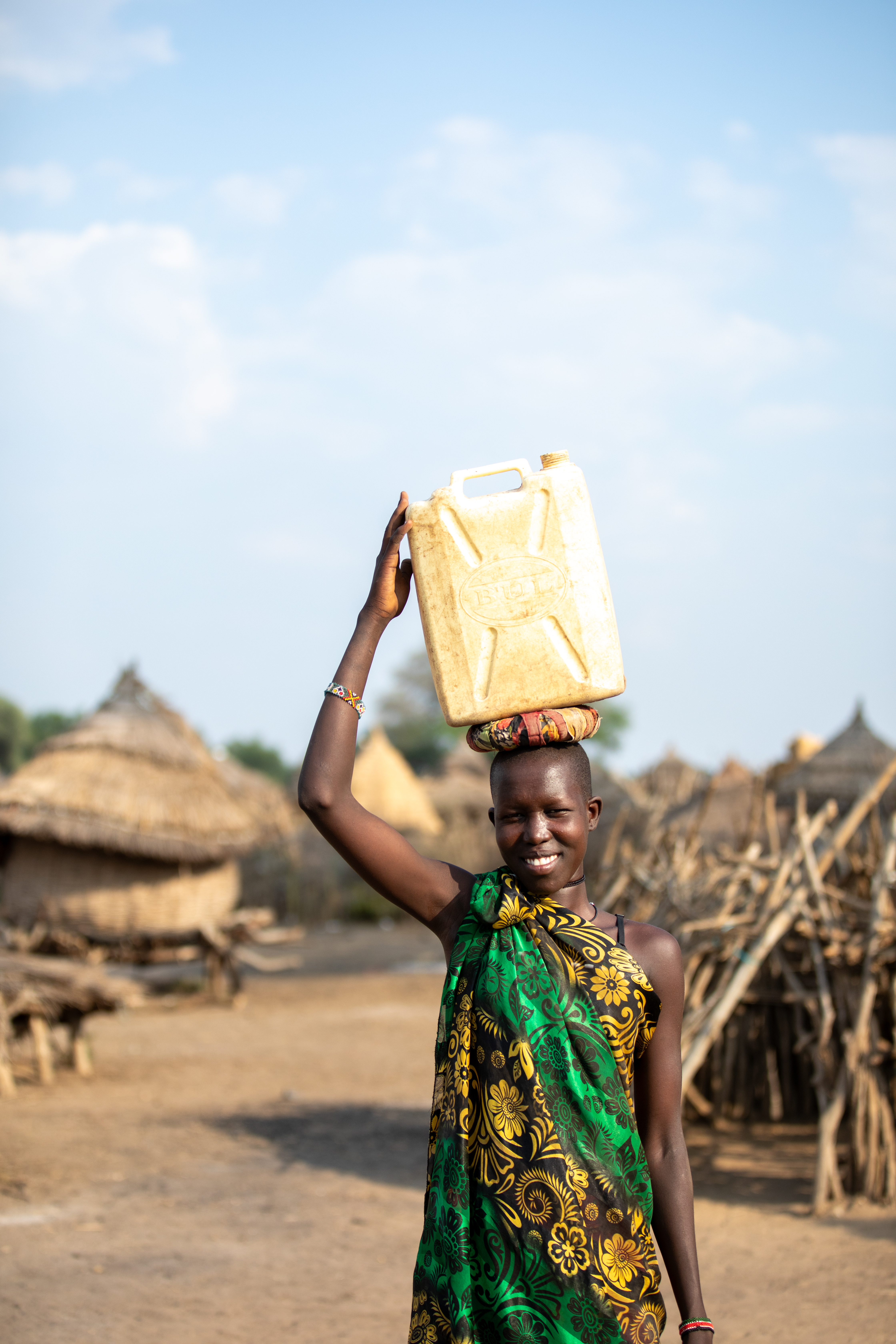 Girl with Water Container