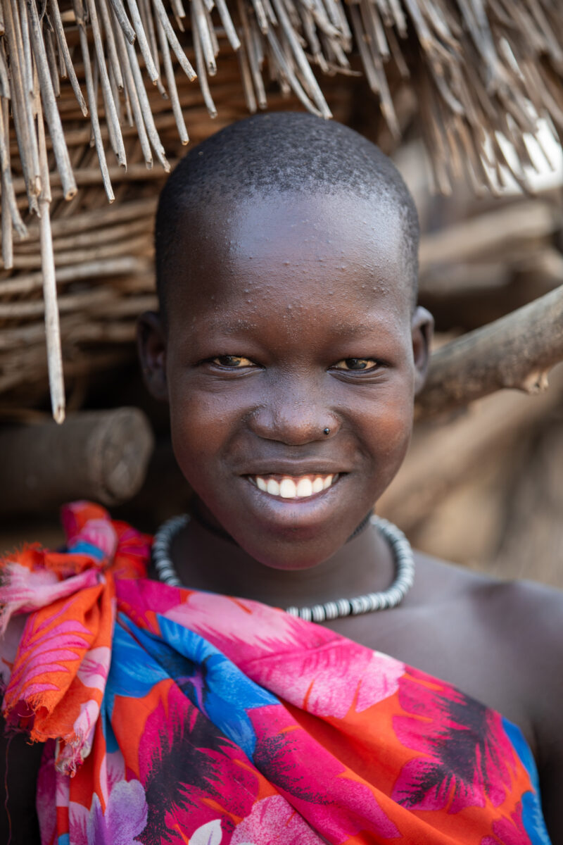 Girl in Africa — Adult, Eyes Open, Frontal Face, Male, One Face