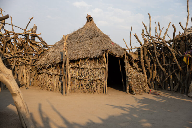 Rural Housing — Round houses made of reeds and sticks provide shelter in Rural South Sudan — South Sudan, Africa, Pastoralists, Ethnic, Rural