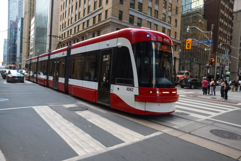Street Car in Toronto — Powered by overhead electric wires, the street cars of Toronto provide clean transportation for the people of Toronto. — Street, Tram...