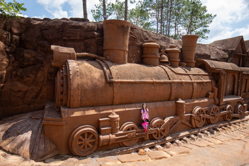 Sculpture Tunnel — Unique sculptures make for fun photos, near Da Lat, Vietnam. — Railroad, Vehicle, Vietnam