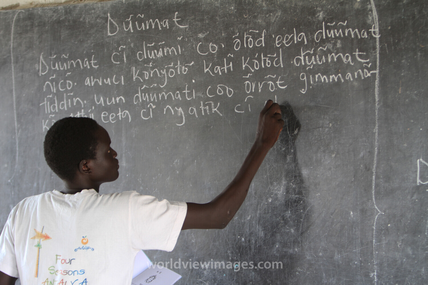 Teacher At Blackboard