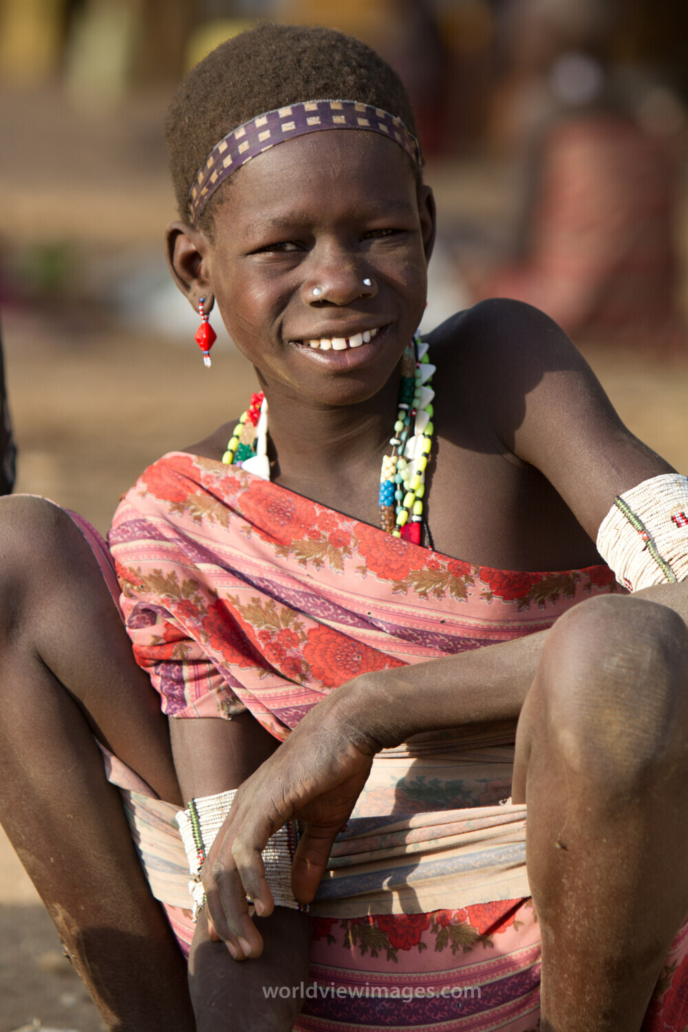Woman Smiles at a Market in  in South Sudan