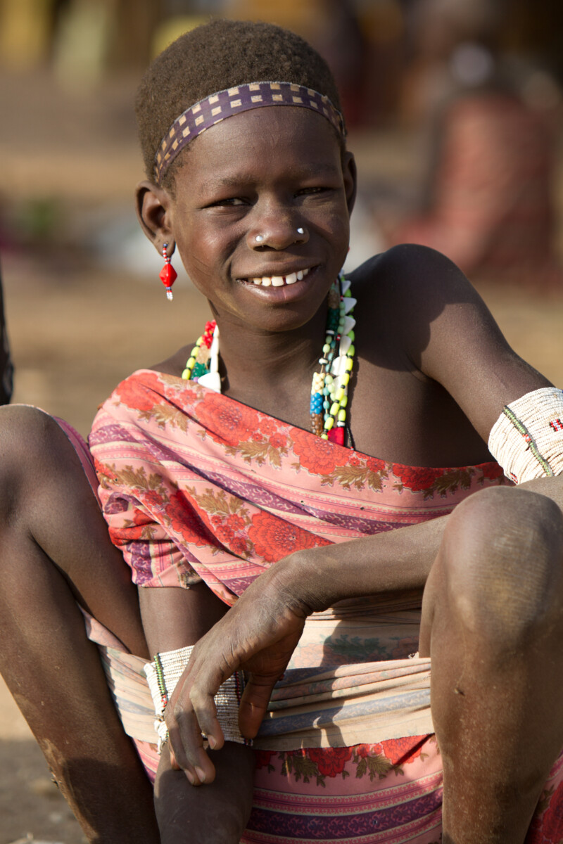 Woman Smiles at a Market in  in South Sudan