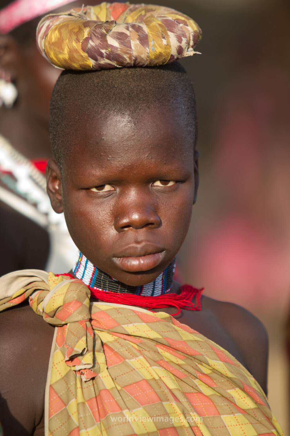 Young Girl with Head Pad
