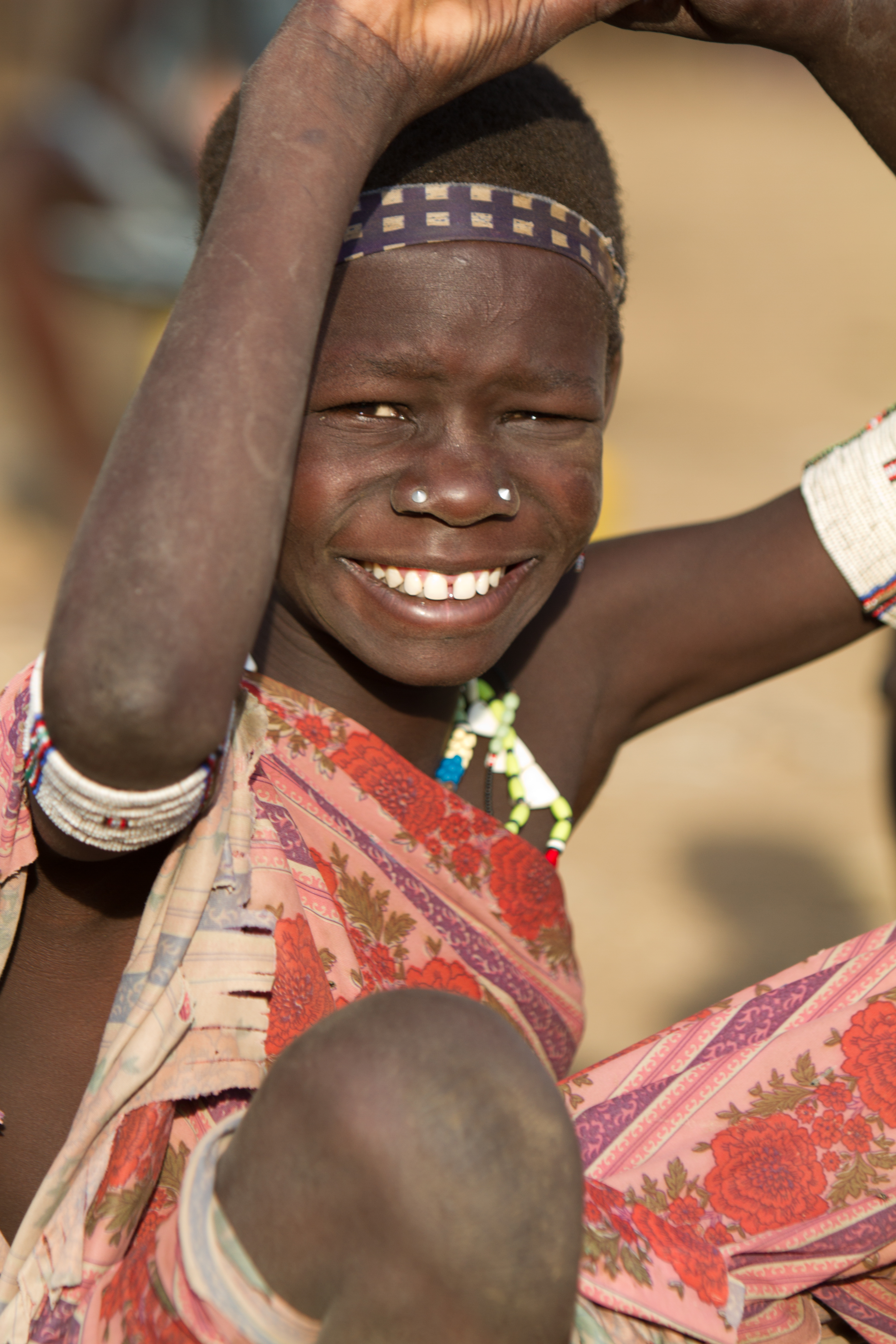 Woman In South Sudan Smiles Brightly