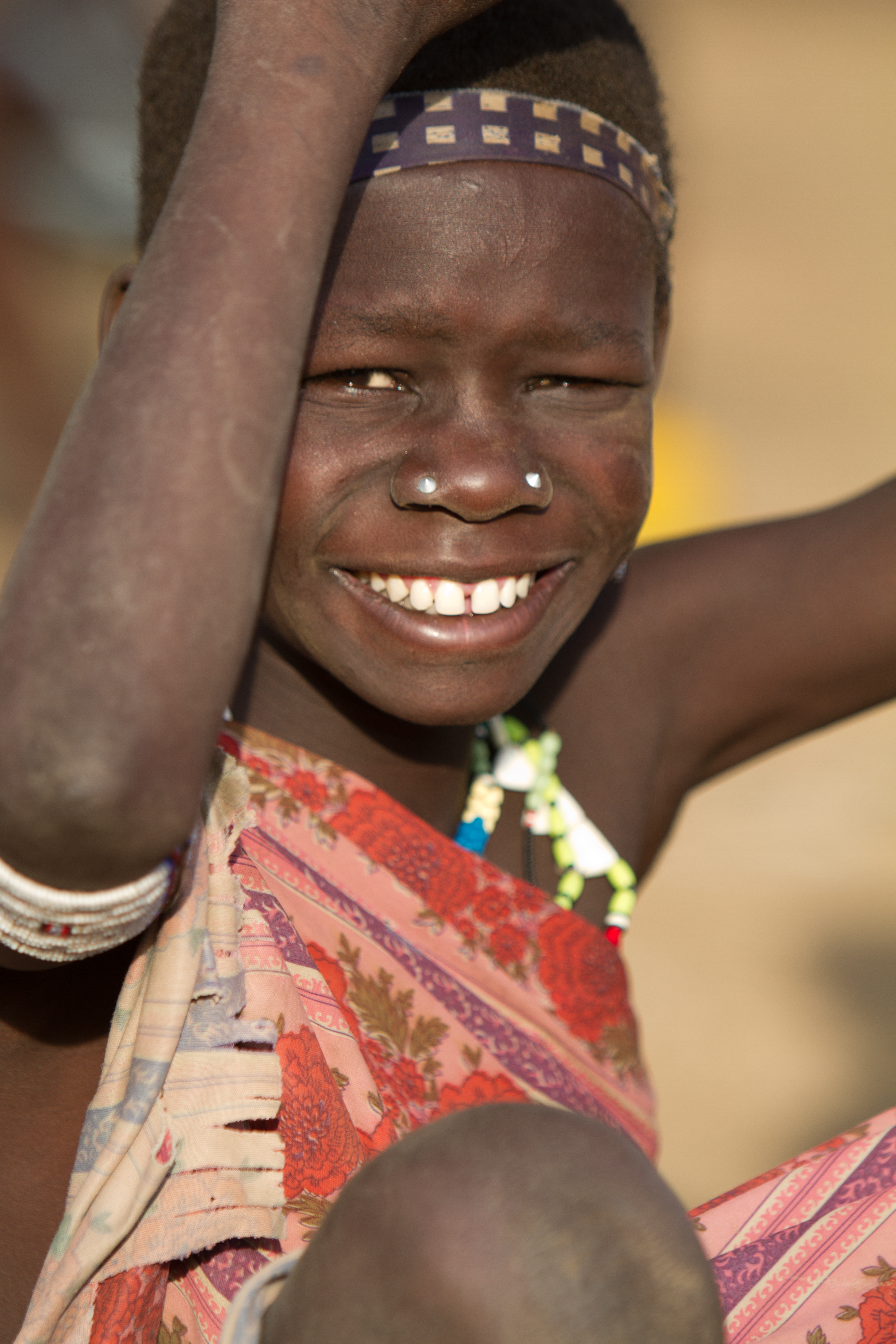 Woman In South Sudan Smiles Brightly