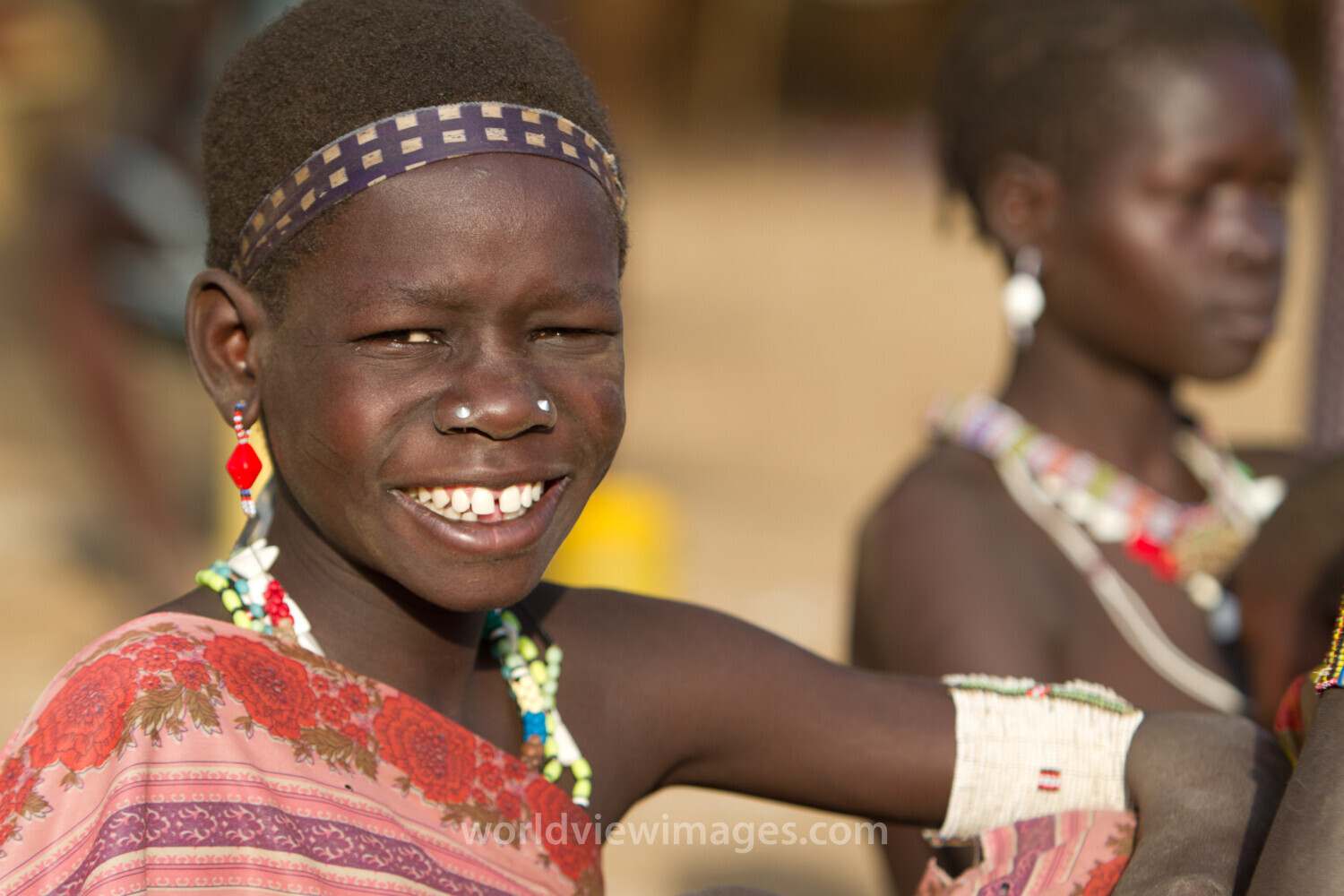 Woman In South Sudan Smiles Brightly