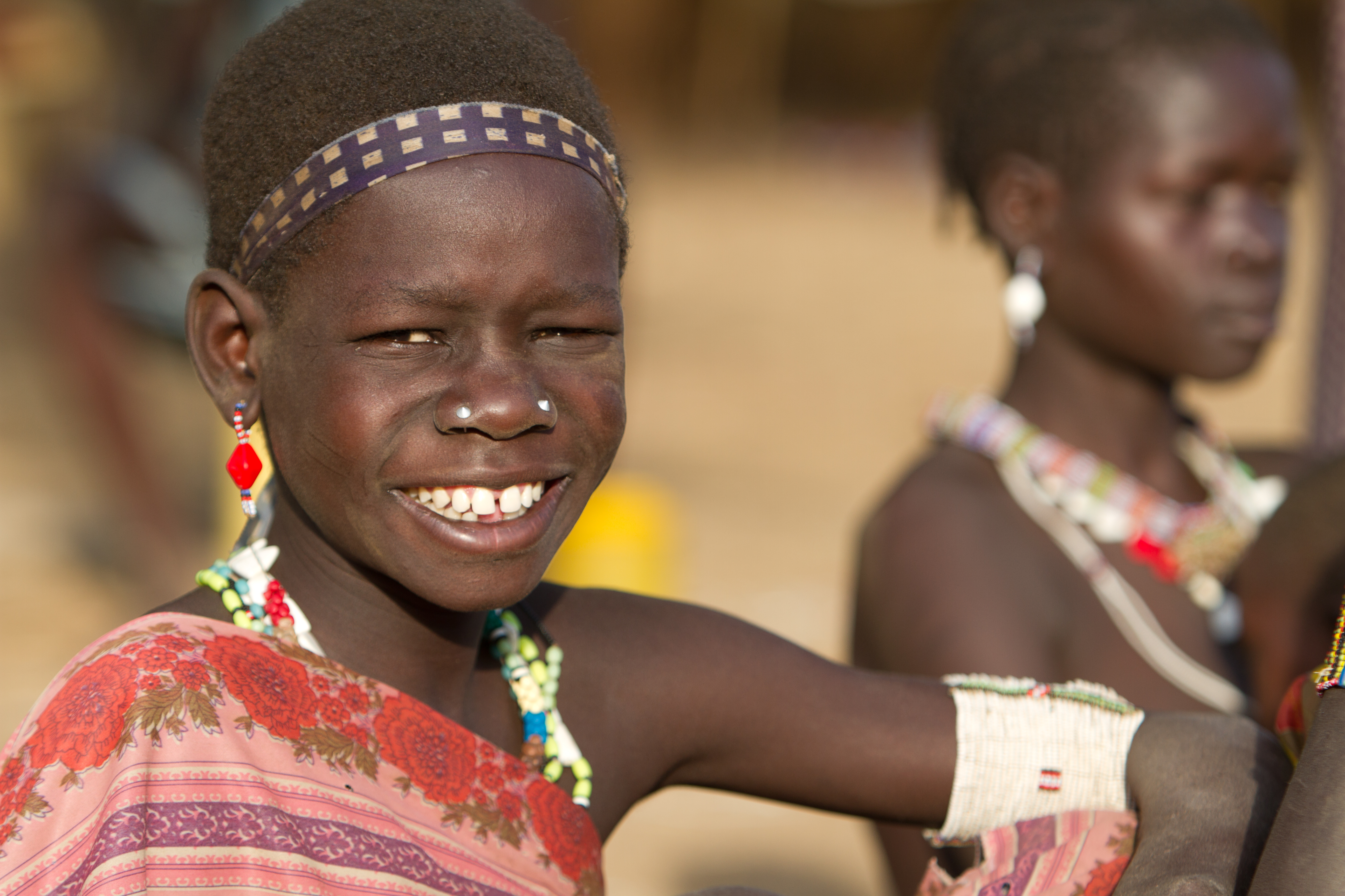 Woman In South Sudan Smiles Brightly