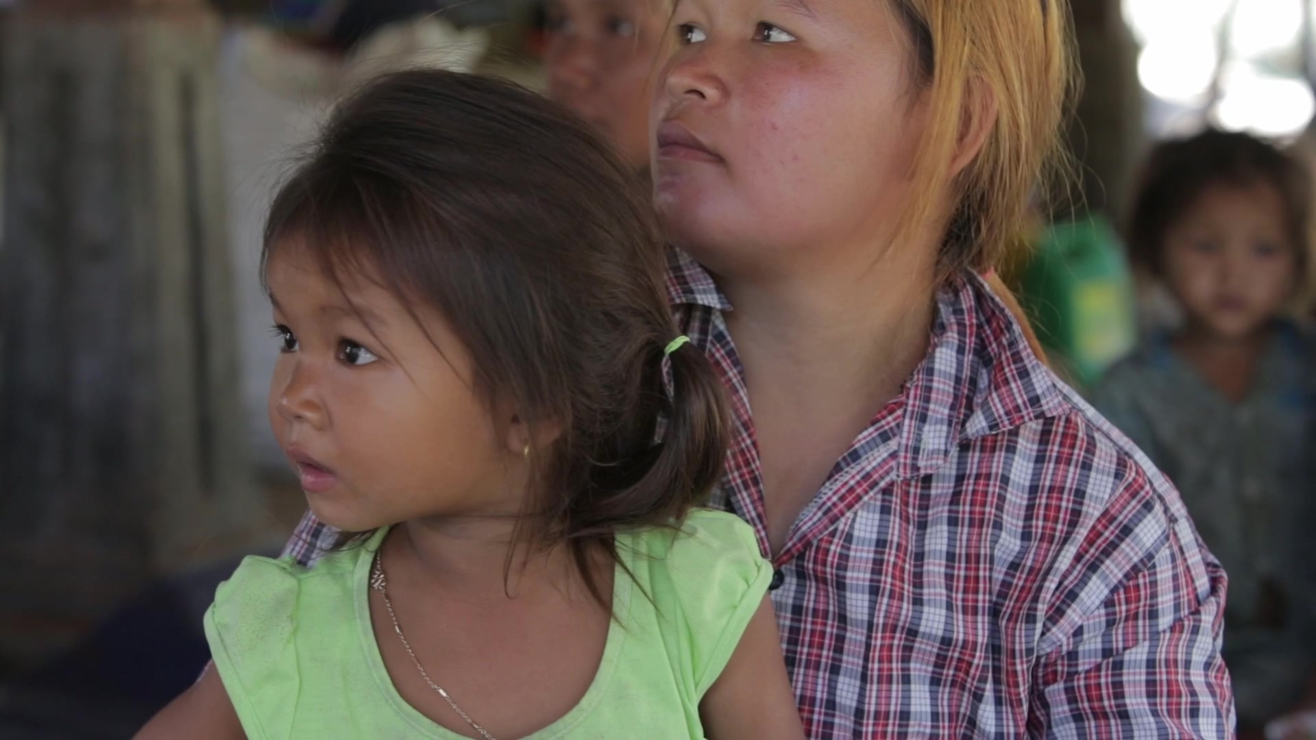 Feeding Child in Cambodia