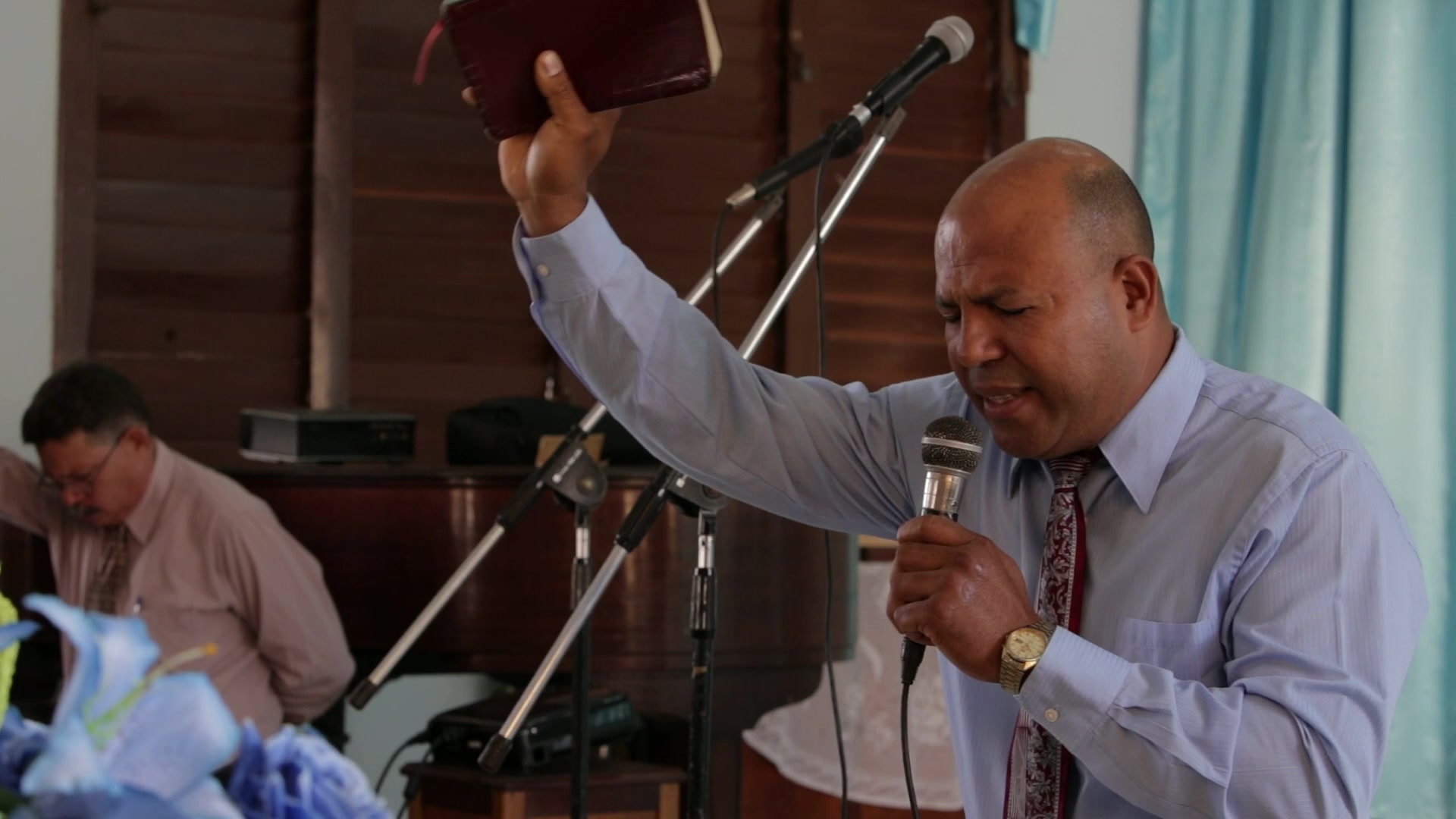 Pastor Prays at a Church in Cuba