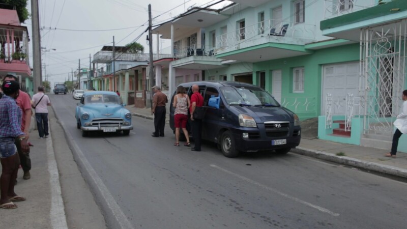 Old Car in Cuba — Old Car passes by on a street in Rural CubaKeywords: Cuba, Classic Car, Vintage car