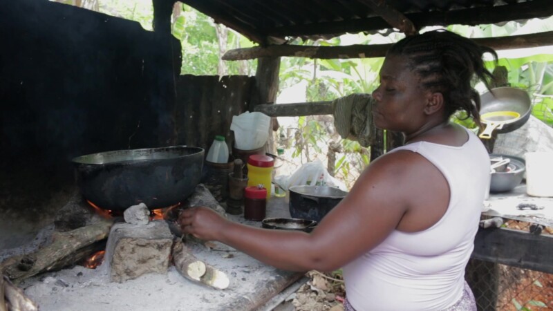 Preparing Food in the Dominican Republic — Stock Video Footage of the Dominican Republic: Mother and Daughter living in a poor community in rural Dominican R...