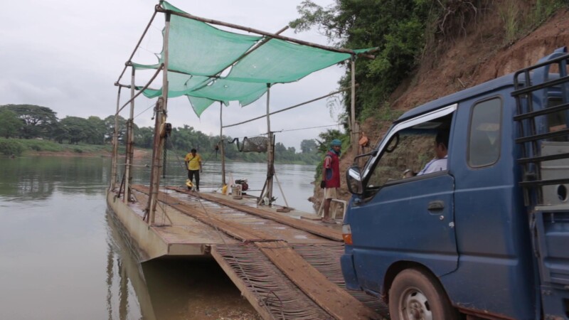 Crossing River by Ferry — Stock Video Footage of Laos: With very few bridges in the country, people in Laos still rely on river ferrys to get across the many...