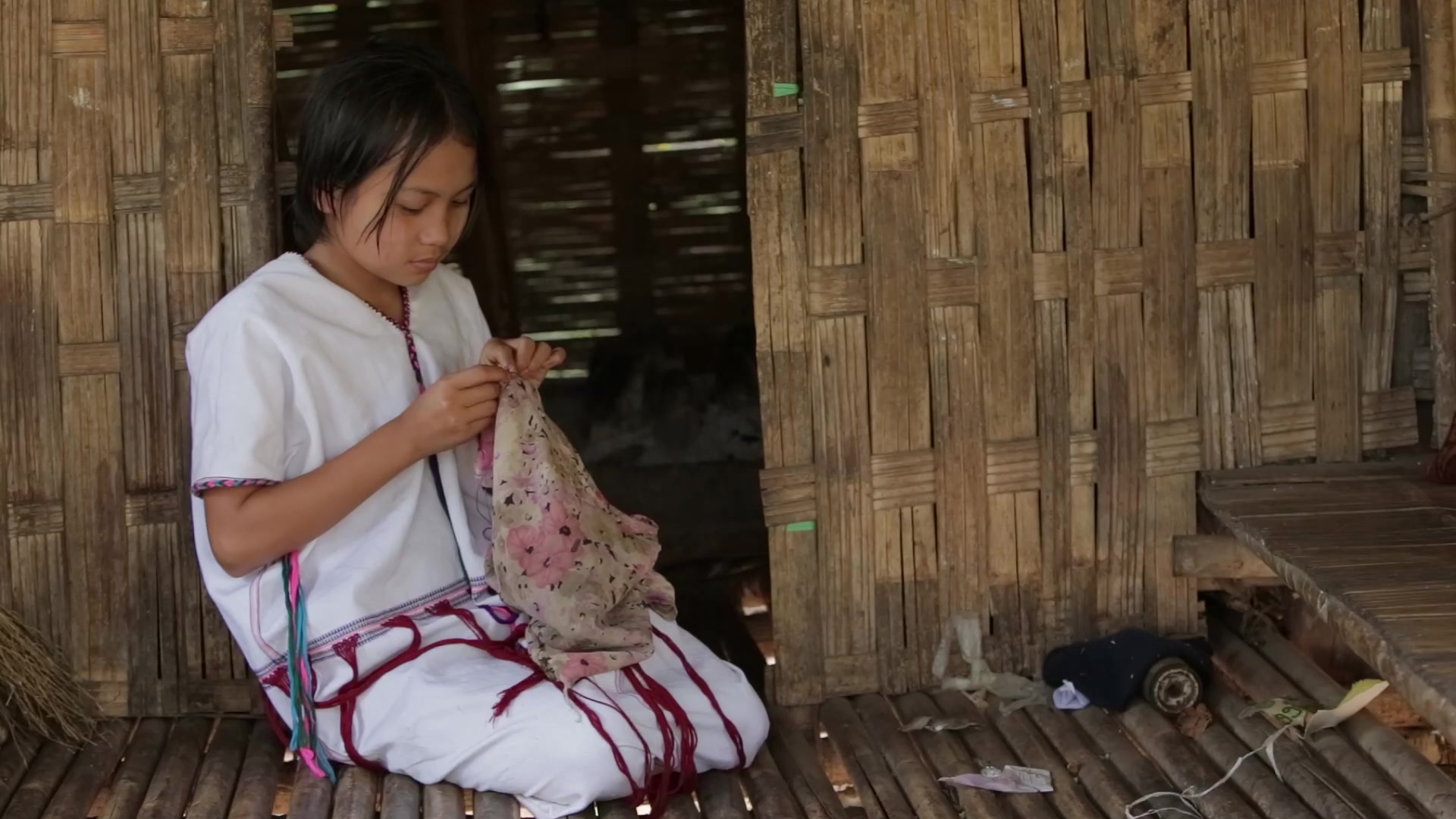 Young Girl in Myanmar Sews