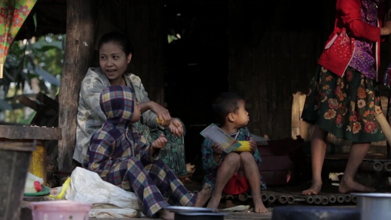 Family in Myanmar eating Breakfast.