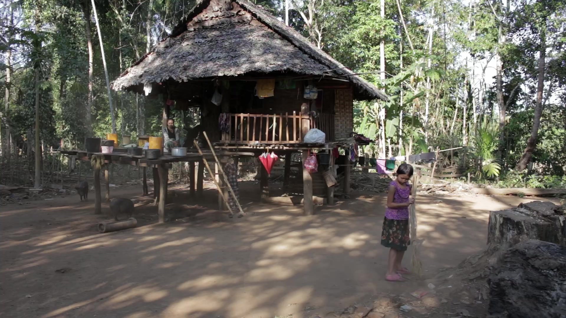 Girls Sweep the Yard