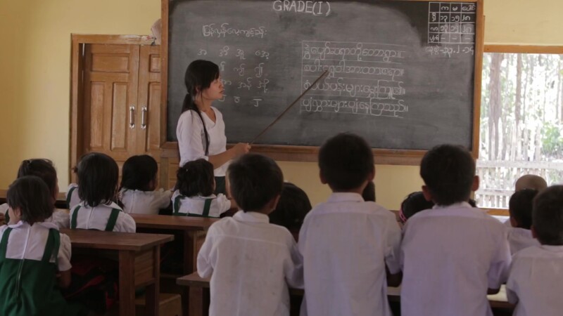Teacher presents Lesson from the Board