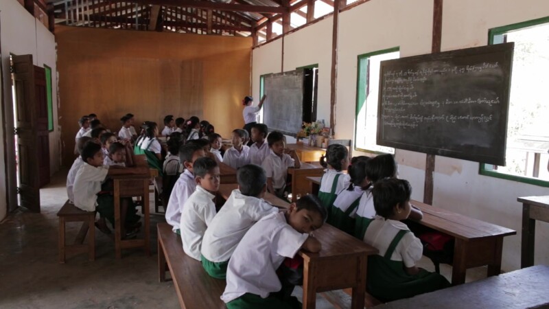 Teacher presents Lesson from the Board