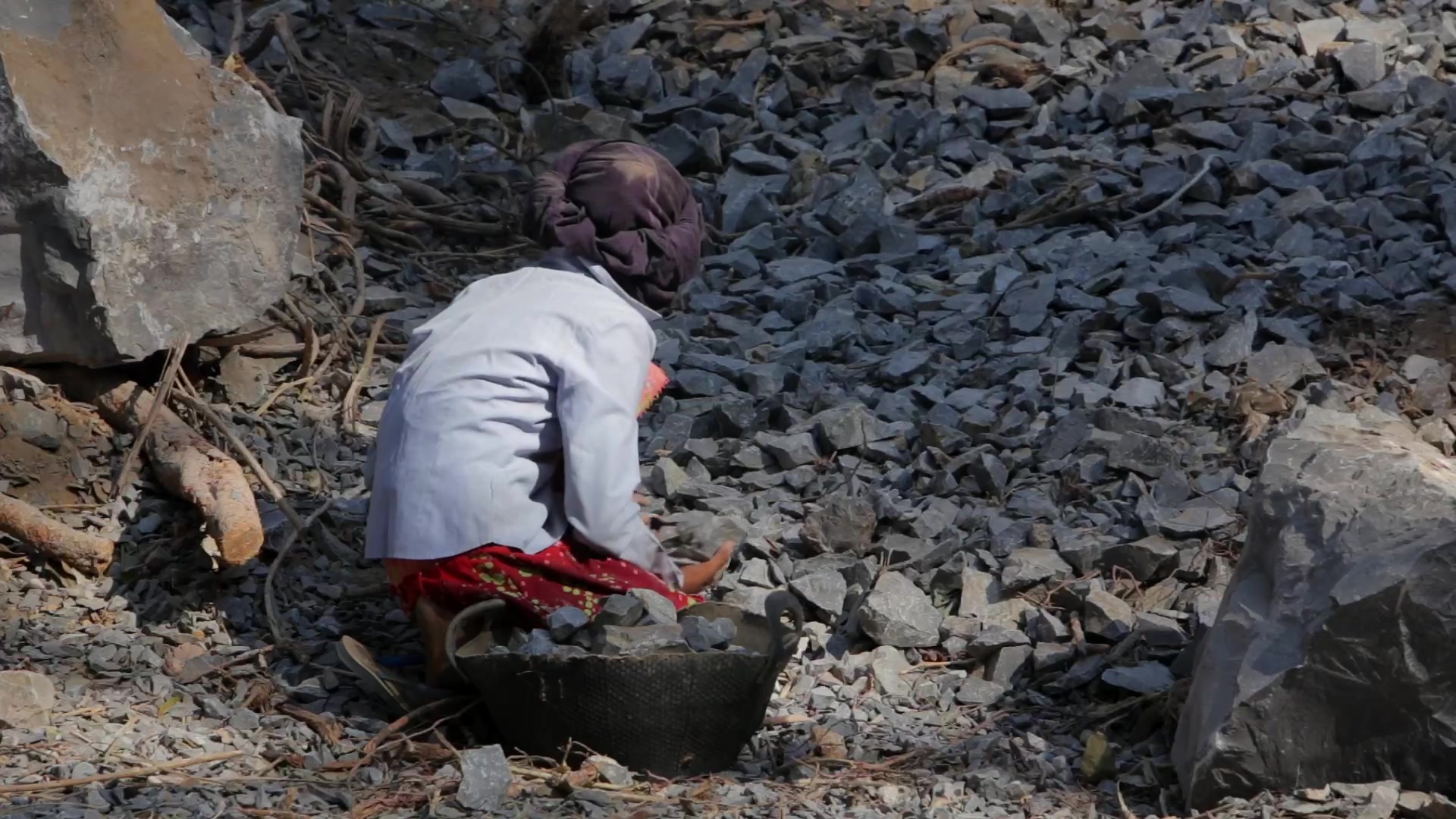 Young Girl Works in a Gravel Pit in Burma