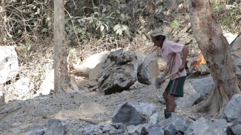 Day Labor Pounding Rocks