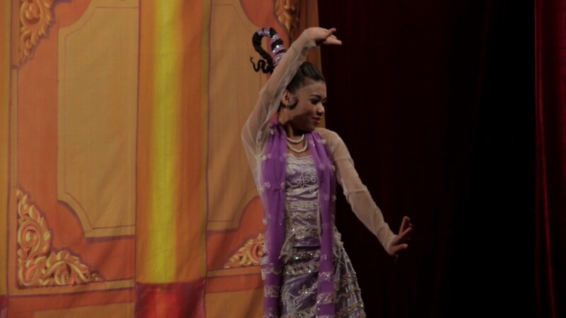 Woman in Myanmar performs Ethnic Dance — Dancing in Burma: Dancers dress up in the traditional clothes of the various ethnic groups of Myanmar (Burma) and pe...