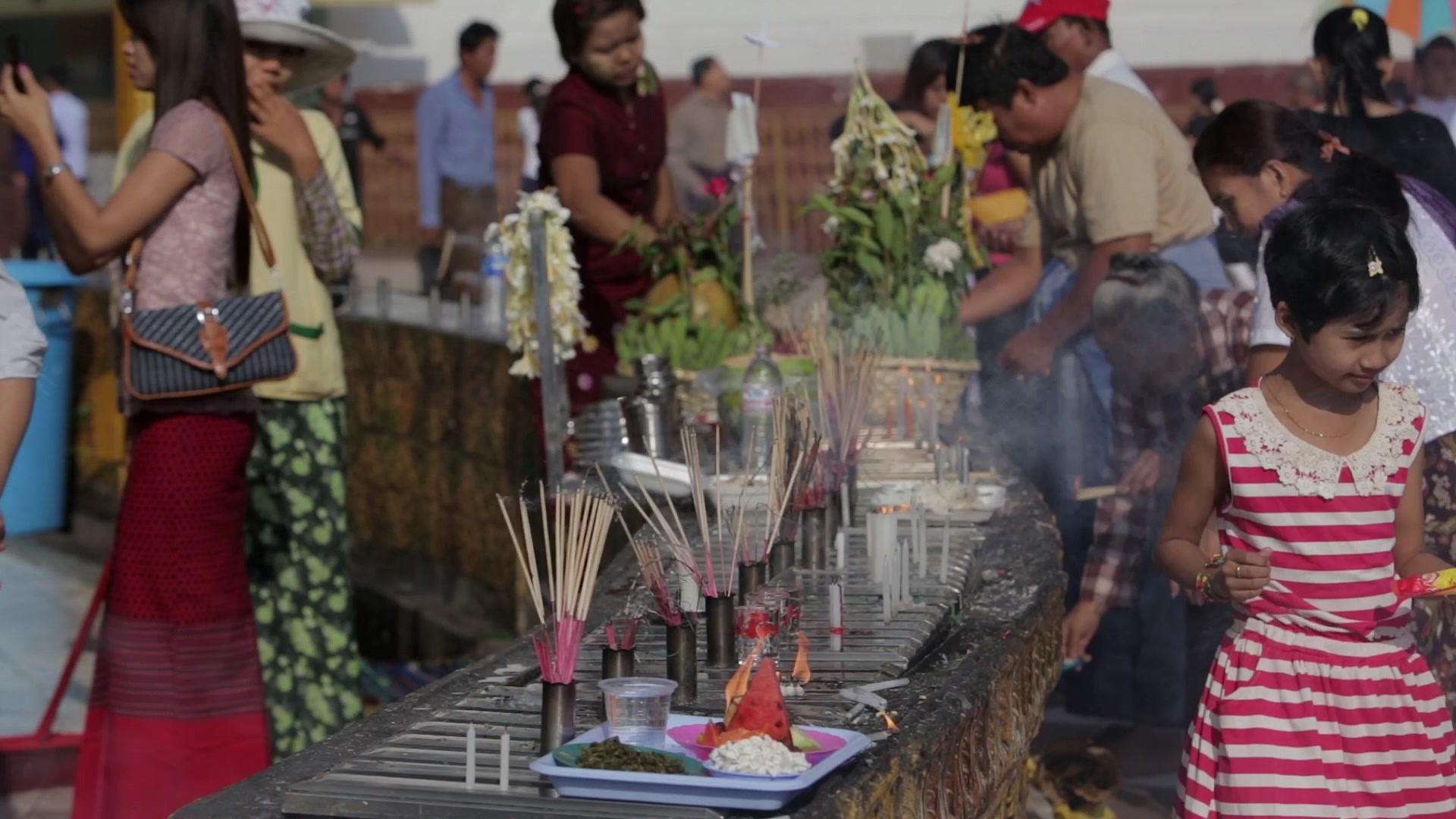 People Worshiping at a Pagoda in Myanmar