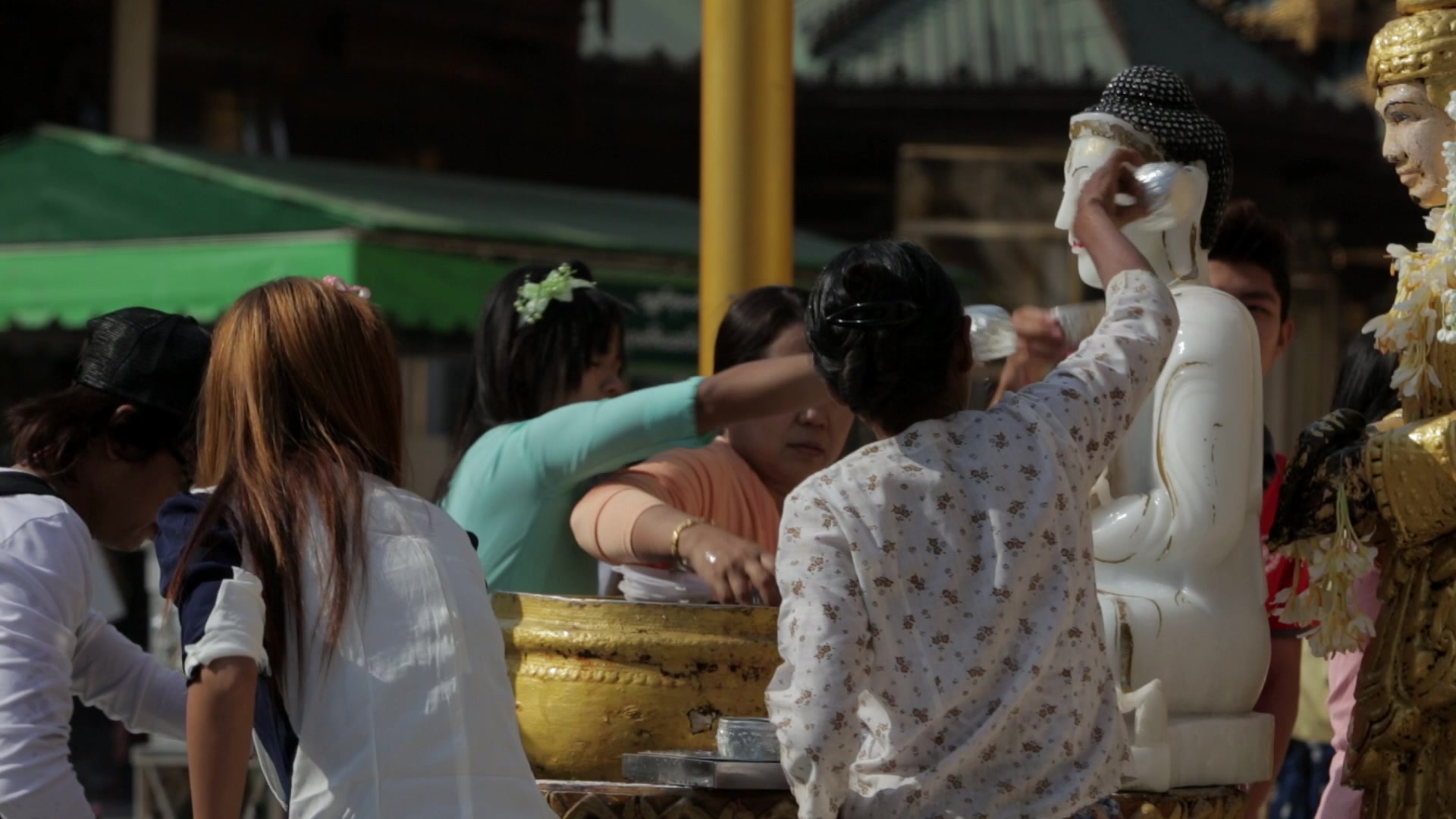 People Worshiping at a Pagoda in Myanmar