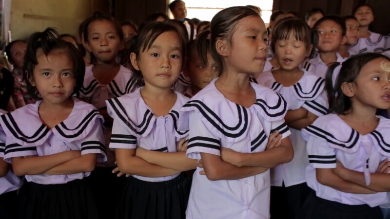 Young Karen Students Sing at School — Children of the Karen Ethnic group sing at their school in MyanmarKeywords: Burma, Child, Children, Karen, Karen State,...