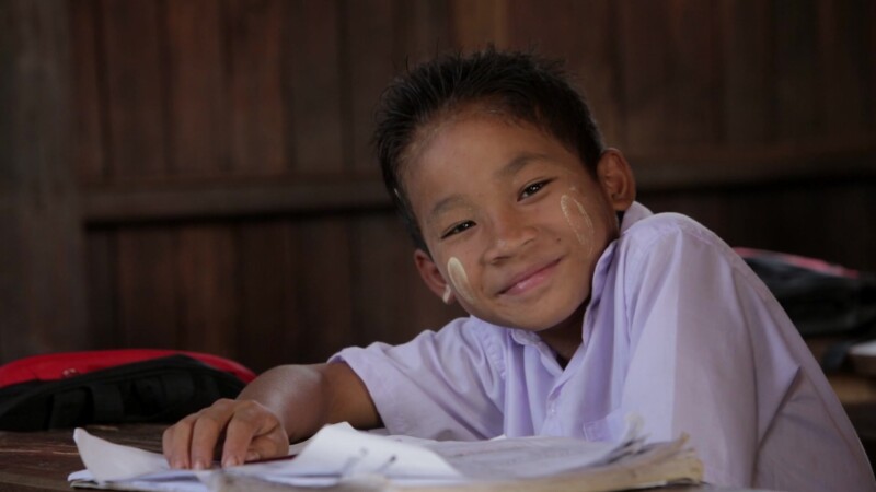 Happy Boy at School in Myanmar — Young Karen boy shows a smile while at his school in MyanmarKeywords: Burma, Child, Children, Karen, Karen State, Kayin Stat...