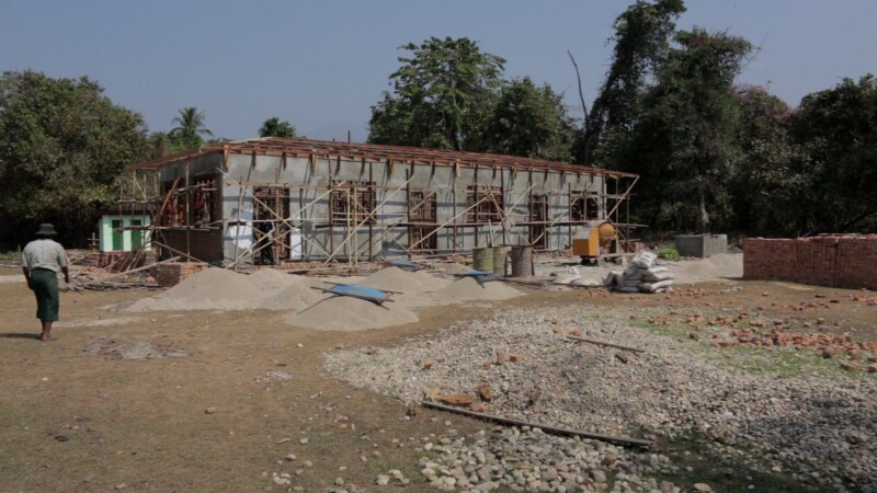 School Under Construction in Myanmar — With funding from Norway, a Karen group living in rural Myanmar construct a new school for their children. — Burma, Ka...