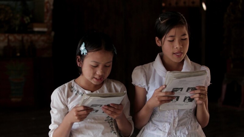 Girls Read in School — Karen Girls read from their lesson book at their school in MyanmarKeywords: Burma, Child, Children, Karen, Karen State, Myanmar, boys,...