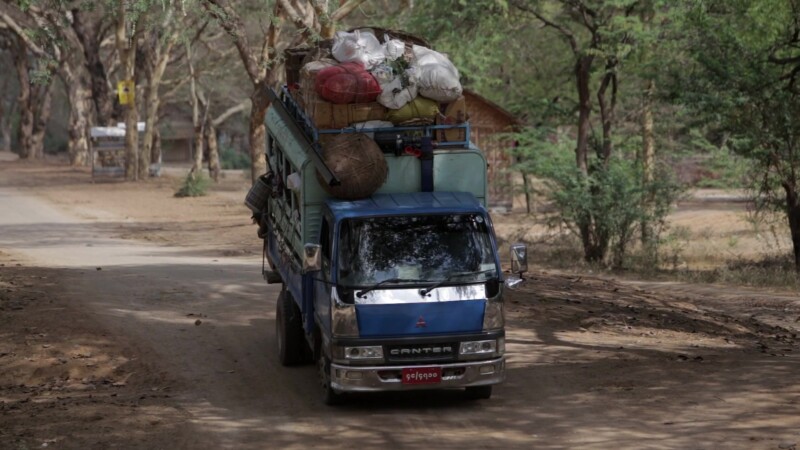 Myanmar 2014 2248440 V1 0107 — Truck on a Dirt Road in MyanmarKeywords: Rural, Myanmar, Burma, Road