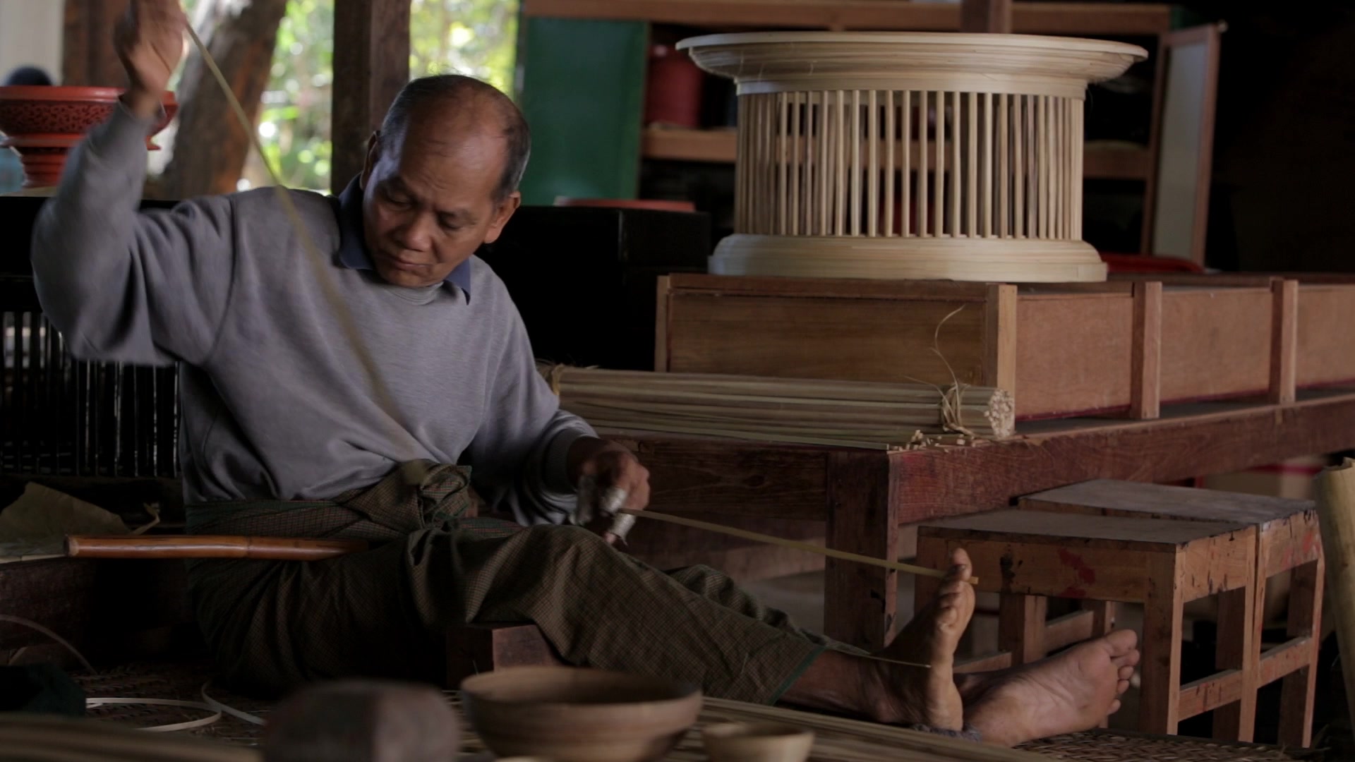 Man works at a Crafts Village in Bagan, Myanmar