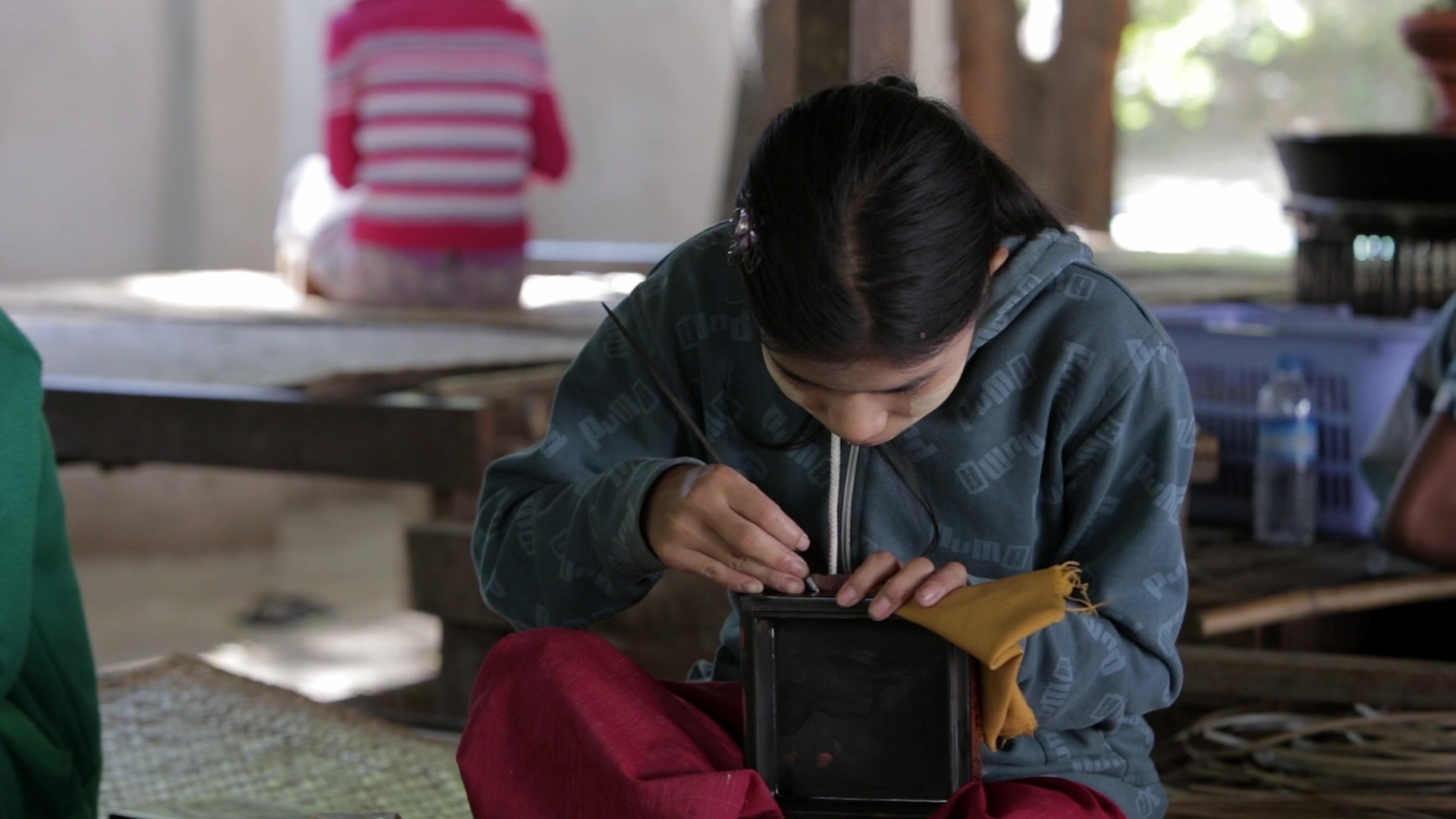 Burmese Woman  Makes Lacquerware