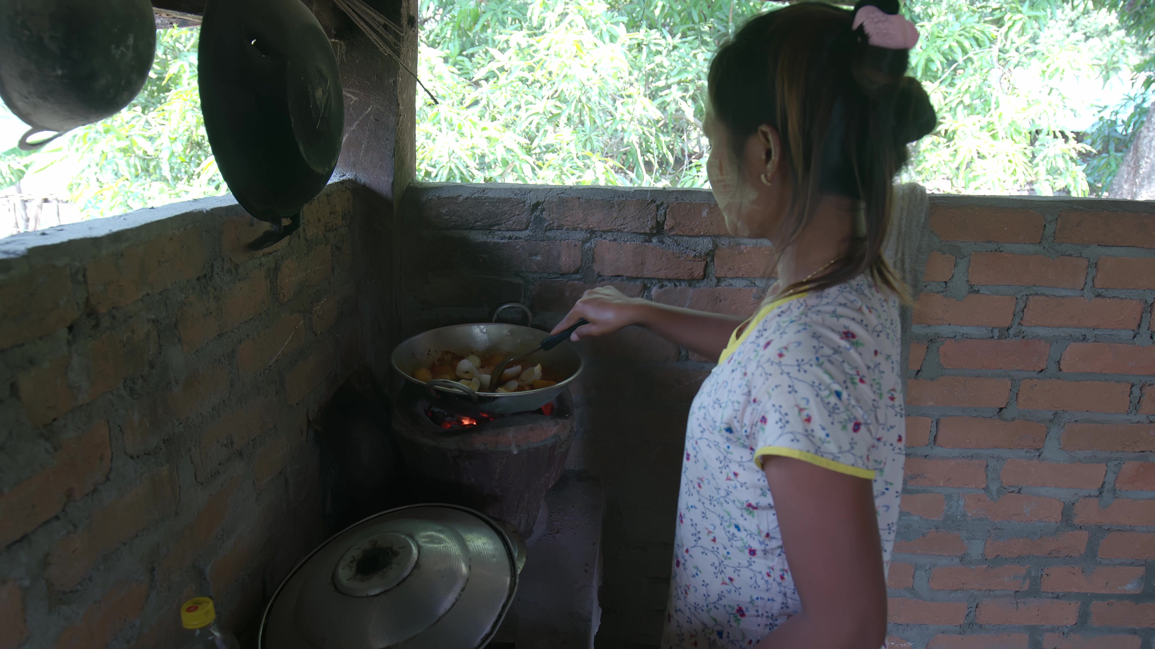 Woman In Myanmar Cooks Dinner