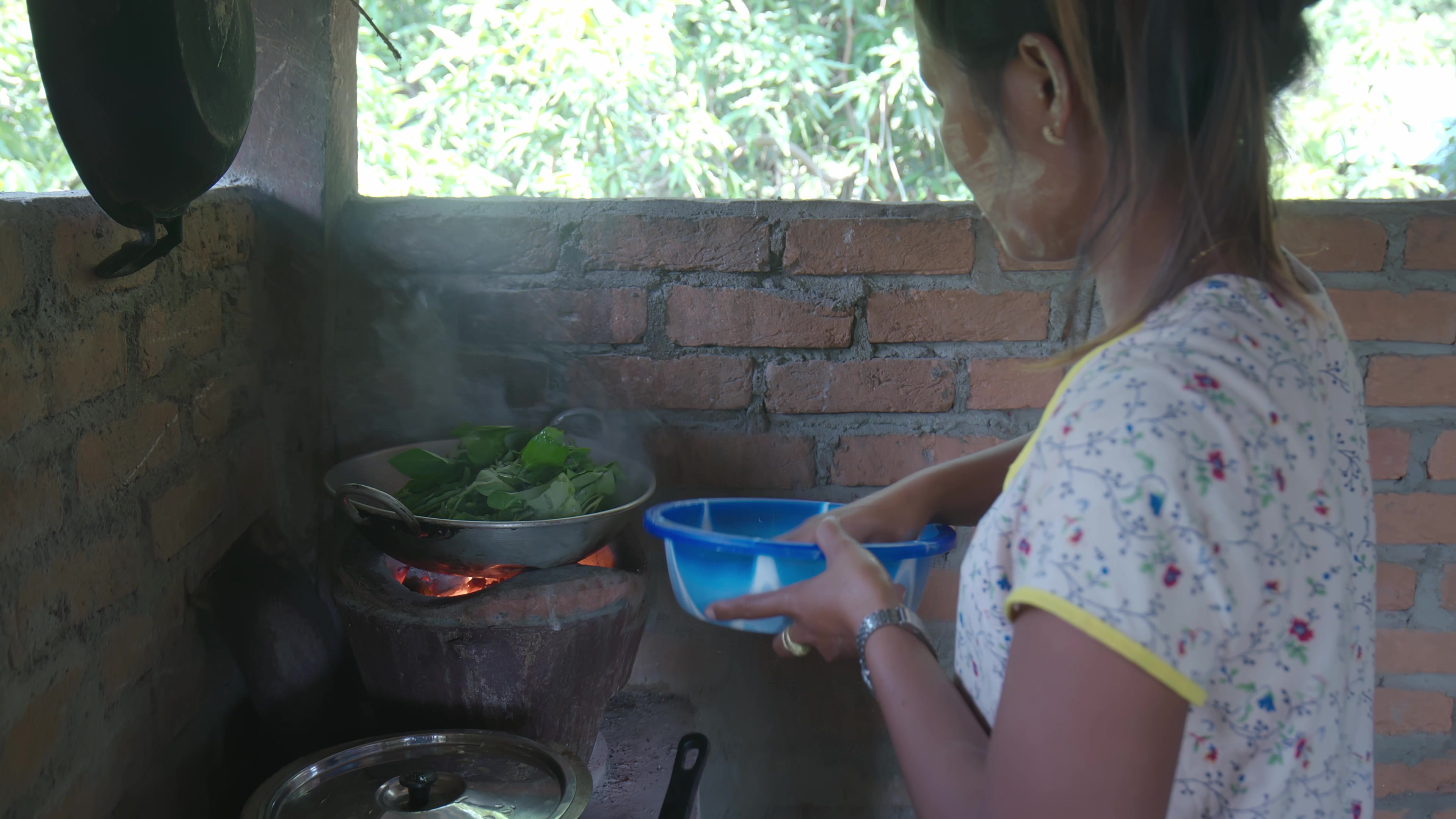 Woman In Myanmar Cooks Dinner