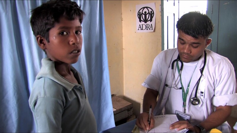 Medical Exam — People displaced by flooding see the doctor at the IDP campKeywords: Nepal, IDP, Internally Displaced