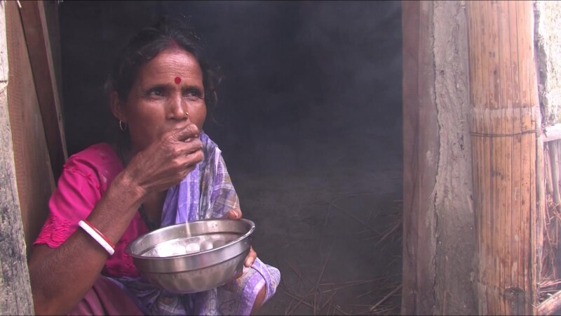 Eating Food — Displaced by floodin, emergency food supplies save lives. — Nepal, IDP, Internally Displaced